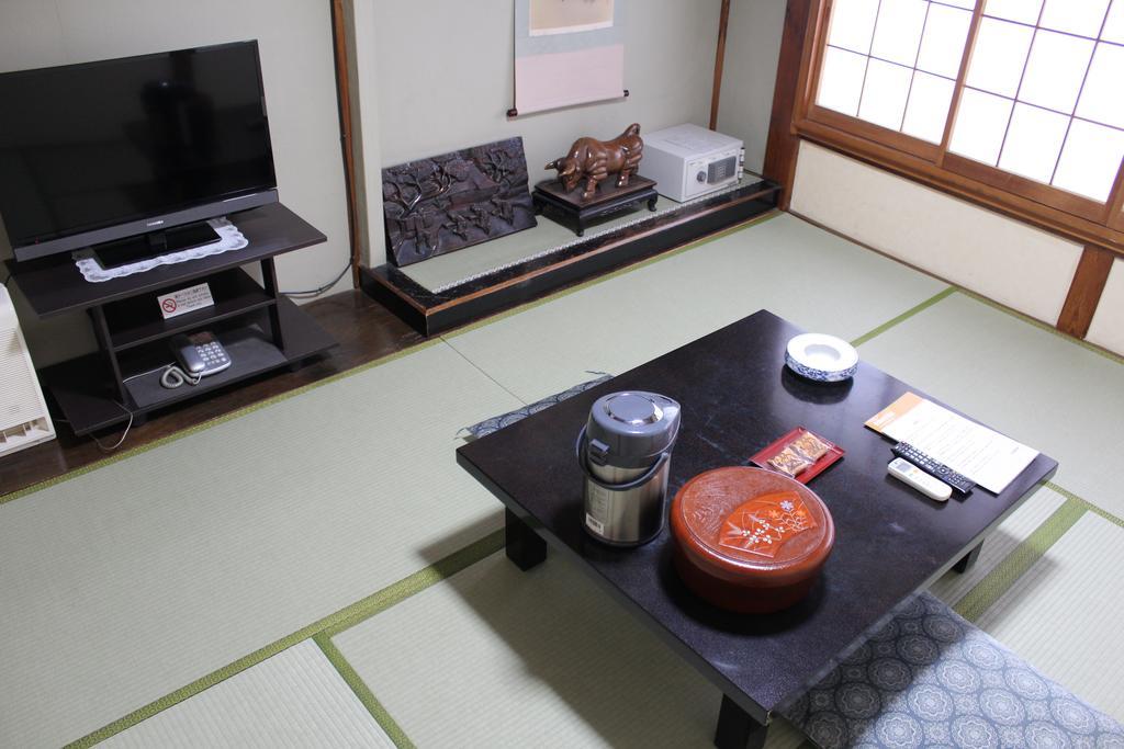 Kinokuniya Ryokan Фудзисава Номер фото